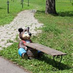 Садовая скамейка медведь