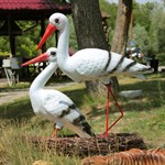 Садовая фигурка гнездо с аистами