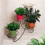 Кованая подставка для цветов фото 