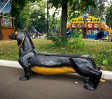 Садовая скамейка собака