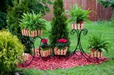Кованые цветочницы для сада
