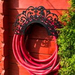 металлический кронштейн для шланга