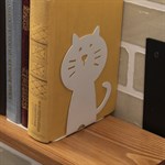 Металлический держатель для книг