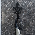 металлический крючок для ванной