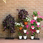 металлические напольные цветочницы