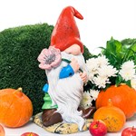 садовая фигура гном с цветком